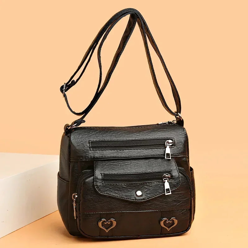 Versatile Multi Pocket Shoulder Bag, Women's Brown Black Leather Messenger Bag with Heart Tassel Embellishments Adjustable Strap