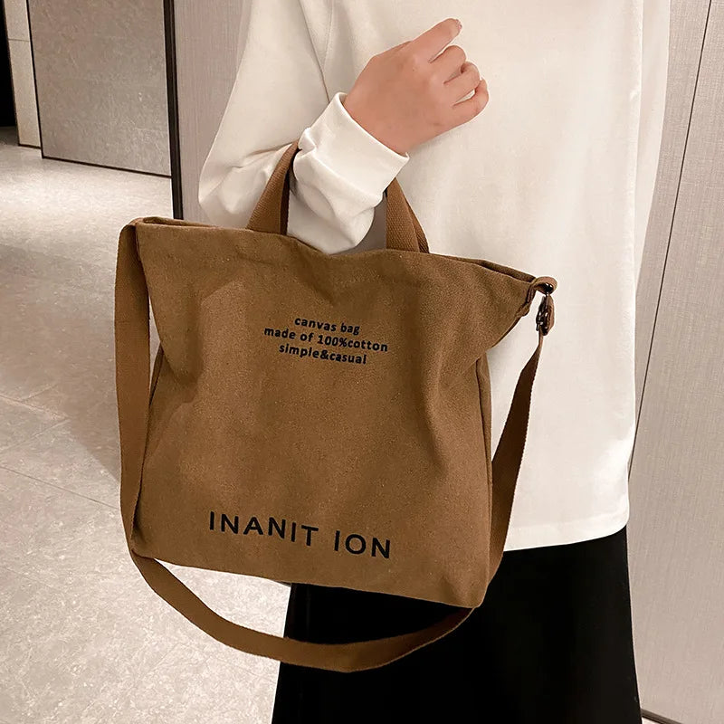 Large capacity backpack Men's and women's shoulder bag canvas crossbody bag Men's handbag College class bag Men's commuter bag