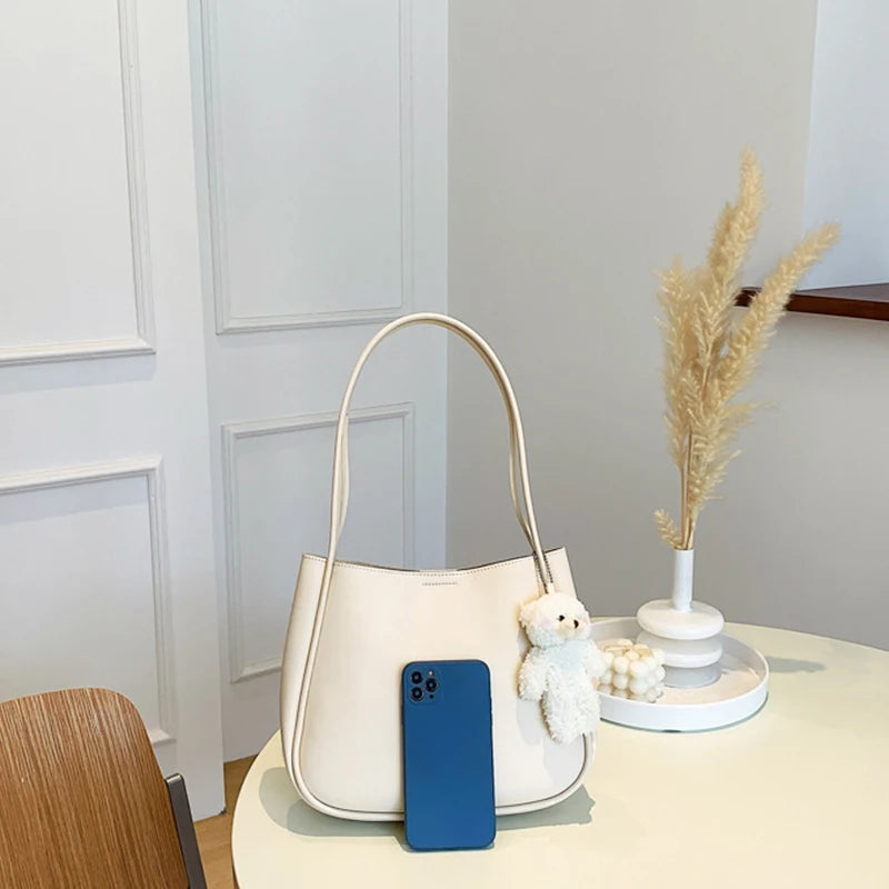 Simple And Casual New Popular PU Leather Versatile Shoulder Underarm Bag Small Fresh Solid Color Bear Pendant Handbag