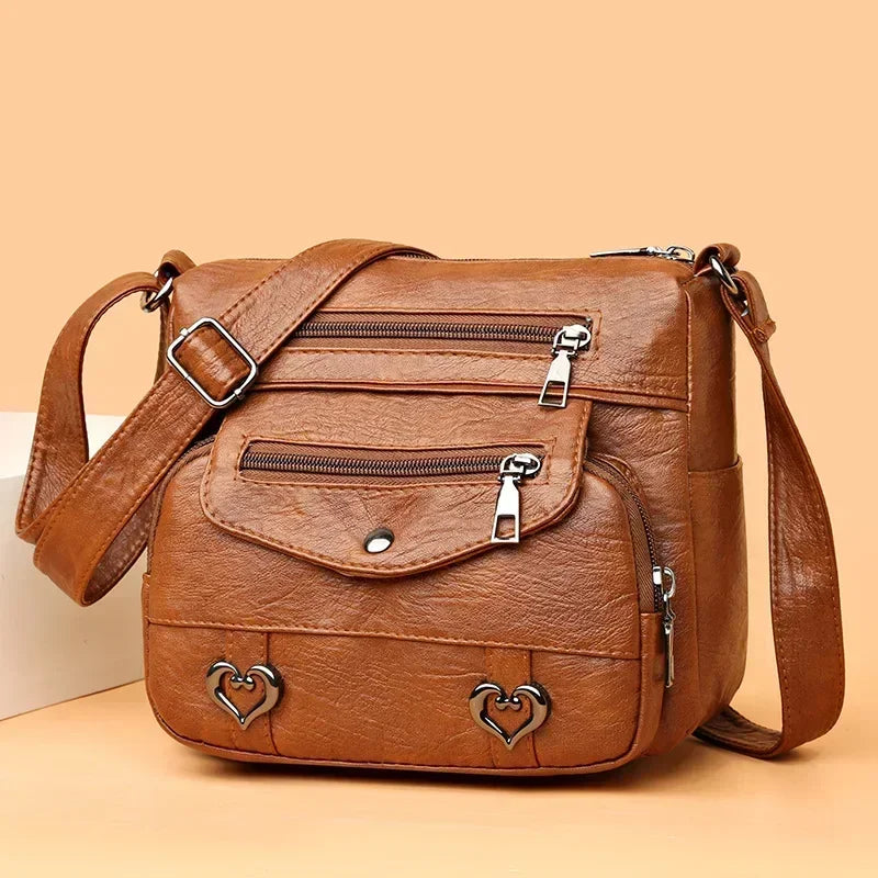 Versatile Multi Pocket Shoulder Bag, Women's Brown Black Leather Messenger Bag with Heart Tassel Embellishments Adjustable Strap