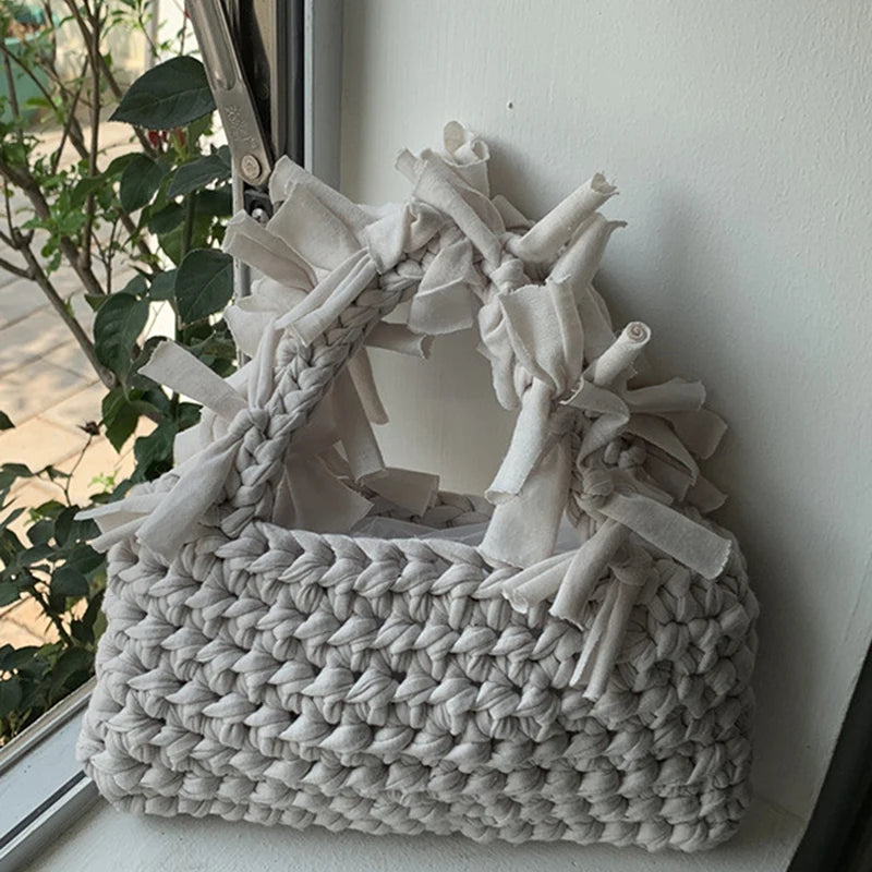 Spring And Summer Handwoven Women's Handheld Bag Leisure Small Fresh Hollow Out Small Design Holiday Bag