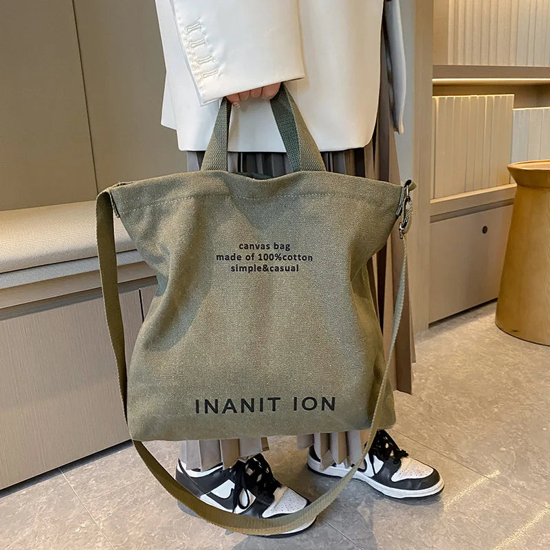 Large capacity backpack Men's and women's shoulder bag canvas crossbody bag Men's handbag College class bag Men's commuter bag