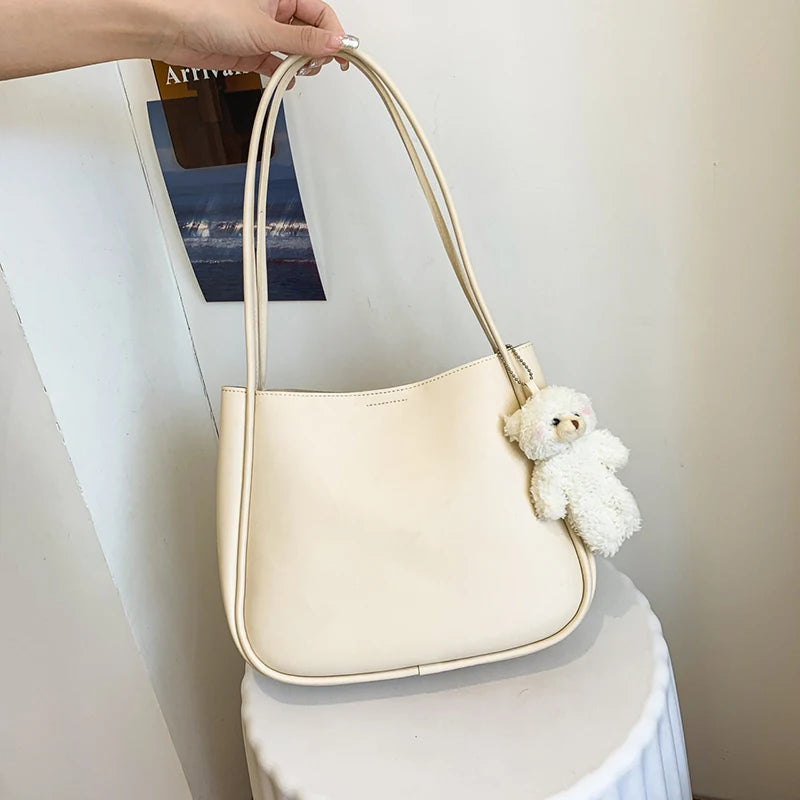 Simple And Casual New Popular PU Leather Versatile Shoulder Underarm Bag Small Fresh Solid Color Bear Pendant Handbag