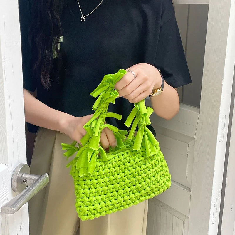 Spring And Summer Handwoven Women's Handheld Bag Leisure Small Fresh Hollow Out Small Design Holiday Bag