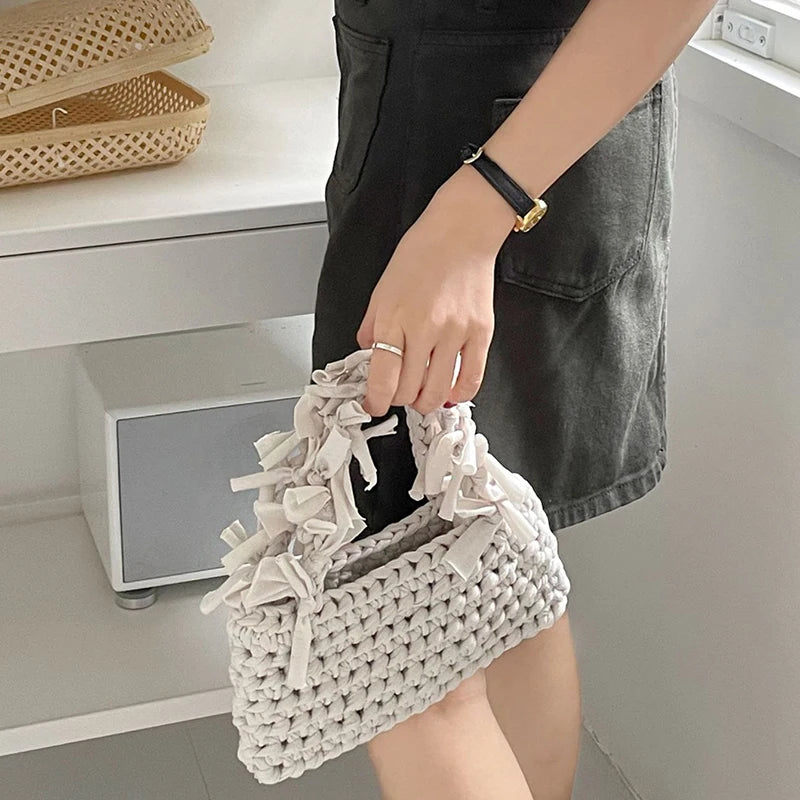 Spring And Summer Handwoven Women's Handheld Bag Leisure Small Fresh Hollow Out Small Design Holiday Bag