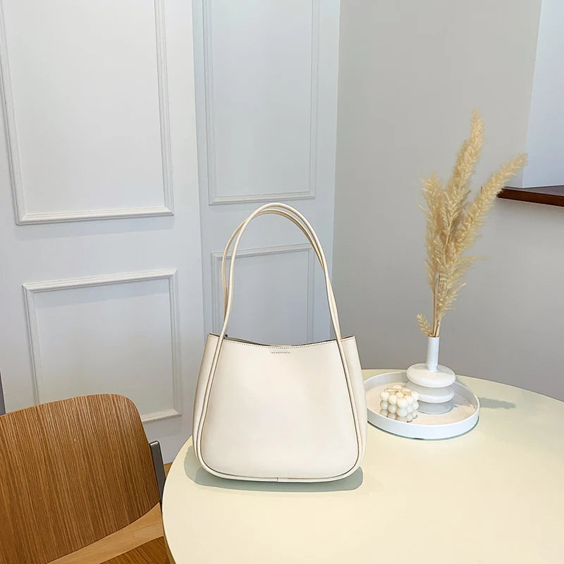 Simple And Casual New Popular PU Leather Versatile Shoulder Underarm Bag Small Fresh Solid Color Bear Pendant Handbag