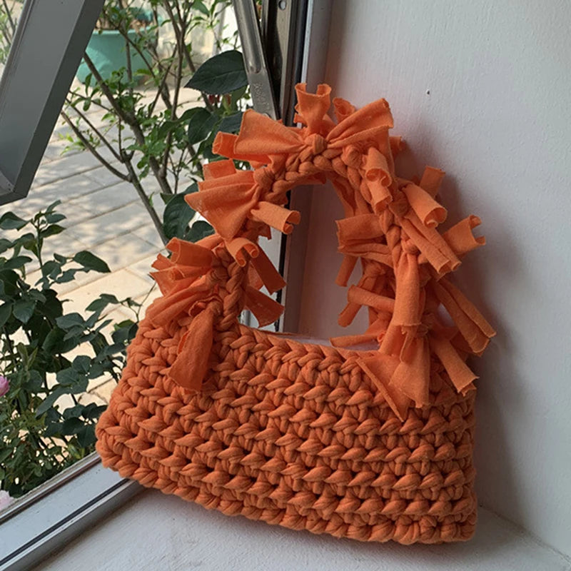 Spring And Summer Handwoven Women's Handheld Bag Leisure Small Fresh Hollow Out Small Design Holiday Bag