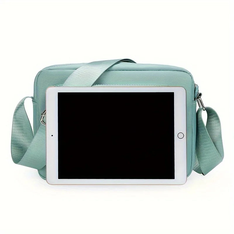 Lightweight Nylon Chic Crossbody Bag for Women - Adjustable Strap, Zip Closure, Tassel Accent, Solid Color