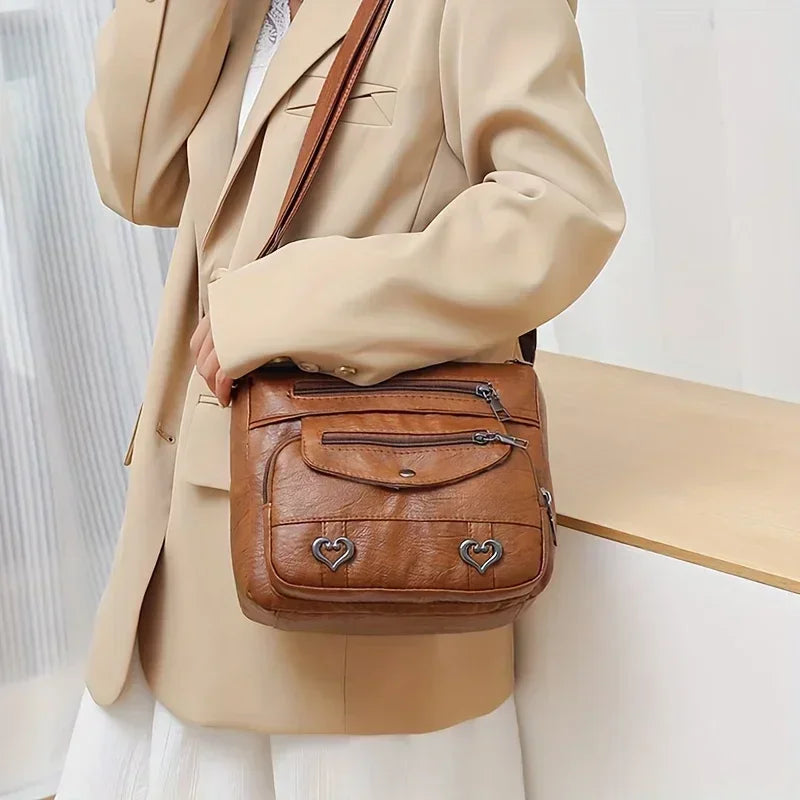 Versatile Multi Pocket Shoulder Bag, Women's Brown Black Leather Messenger Bag with Heart Tassel Embellishments Adjustable Strap